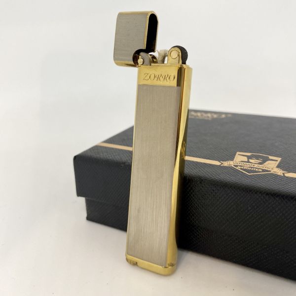 Елегантна Бензинова Запальничка ZORRO у золотистому кольорі
