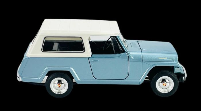 Масштабна автомодель 1967 Jeep Jeepster Commando Station Wagon (1:24) від Welly NEX