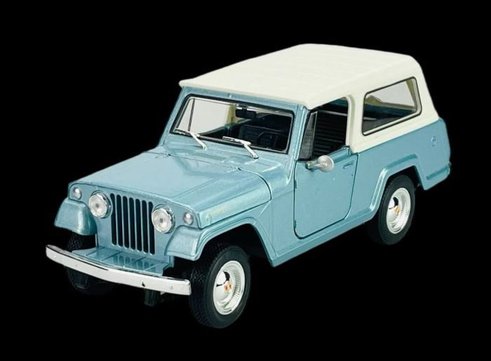 Масштабна автомодель 1967 Jeep Jeepster Commando Station Wagon (1:24) від Welly NEX