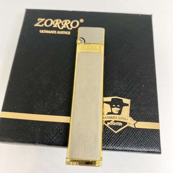 Елегантна Бензинова Запальничка ZORRO у золотистому кольорі