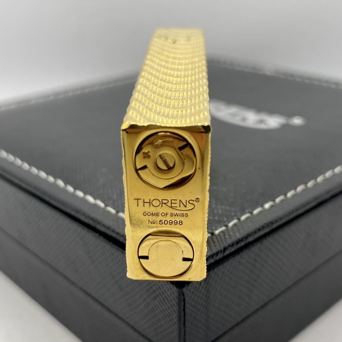 Газова Запальничка Thorens з унікальним хвилястим гравіюванням золотиста