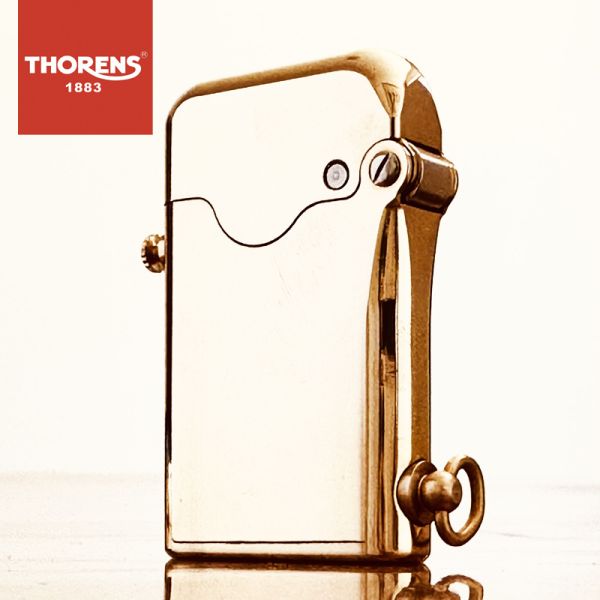 Елегантна бензинова запальничка Thorens золотистого кольору
