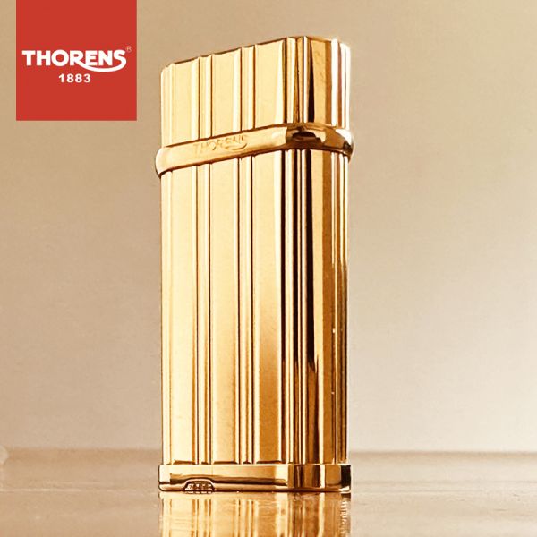 Преміальна золотиста газова запальничка Thorens з вертикальними смугами